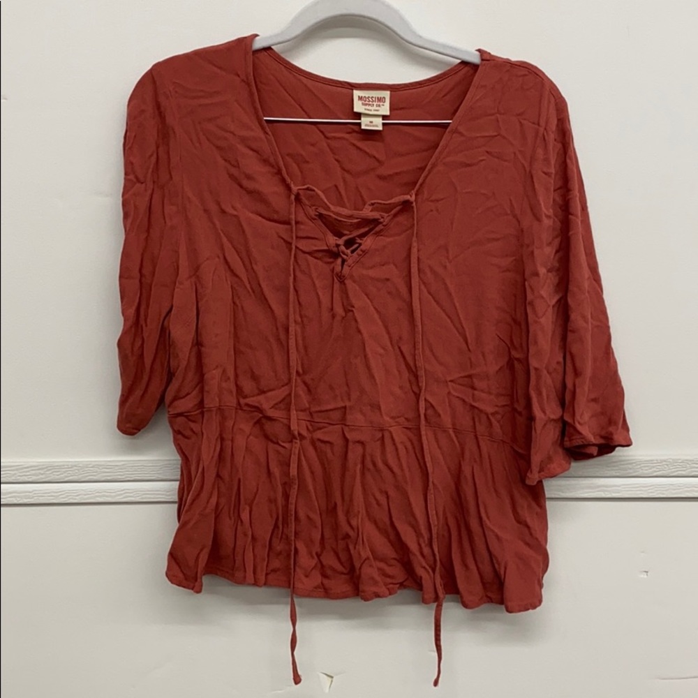 Short blouse with laced V-neck